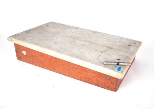 A MID 20TH CENTURY OAK AND MARBLE CHEESE CUTTER