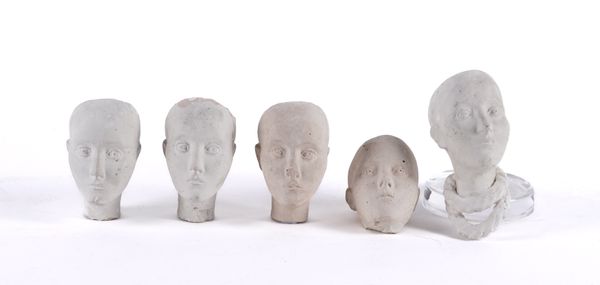 A GROUP OF FIVE PLASTER HEADS (5)