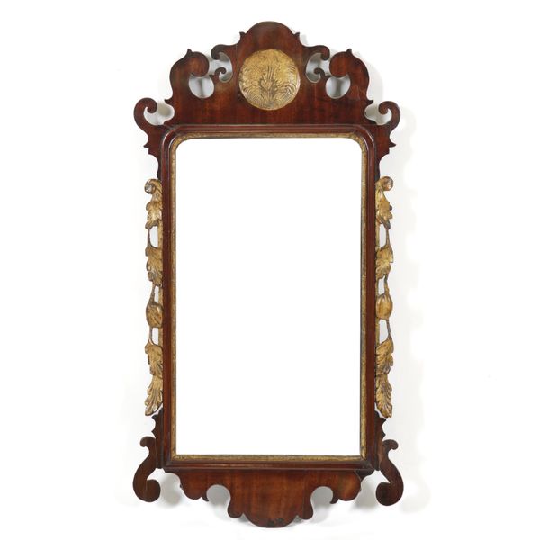 A GEORGE III PARCEL GILT FRET CUT WALNUT PIER MIRROR (2)