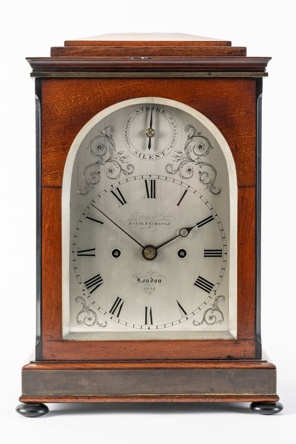 A LATE WILLIAM IV MAHOGANY AND BRASS MOUNTED STRIKING AND REPEATING BRACKET CLOCK