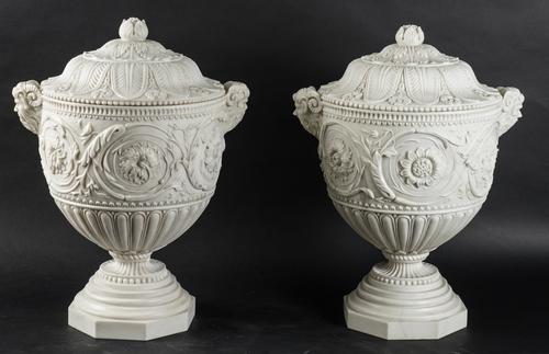 A PAIR OF MARBLE URNS WITH COVERS (2)