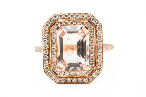 A MORGANITE AND DIAMOND RING