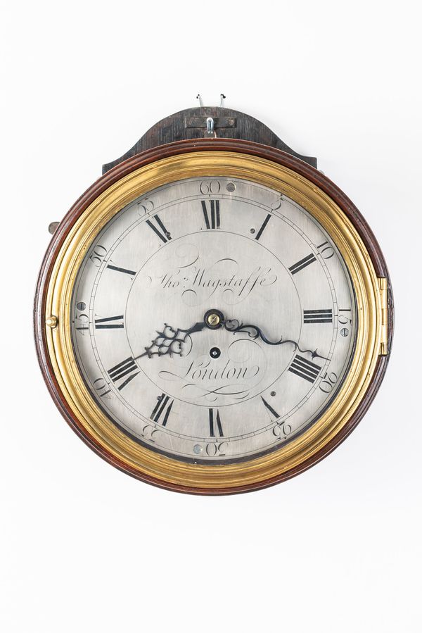 A GEORGE III MAHOGANY TEN-INCH VERGE DIAL CLOCK