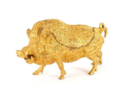 A GILT-BRONZE TABLE BOX OR CASKET MODELLED AS WILD BOAR