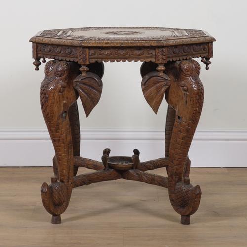 A BURMESE CARVED TEAK OCTAGONAL OCCASIONAL TABLE