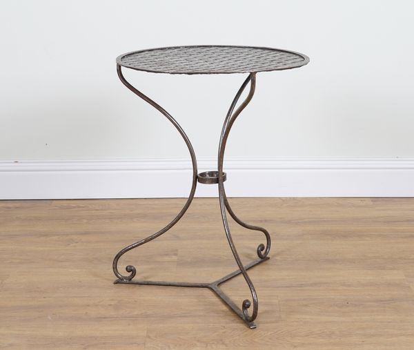 AN EARLY 20TH CENTURY CIRCULAR POLISHED METAL GARDEN TABLE