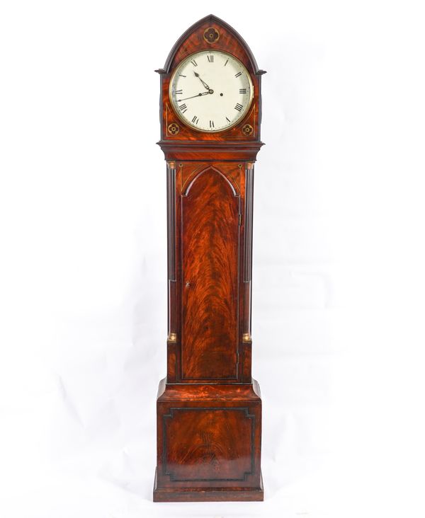 A LATE REGENCY MAHOGANY AND BRASS INLAID LONGCASE CLOCK