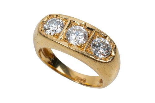 A THREE STONE DIAMOND RING