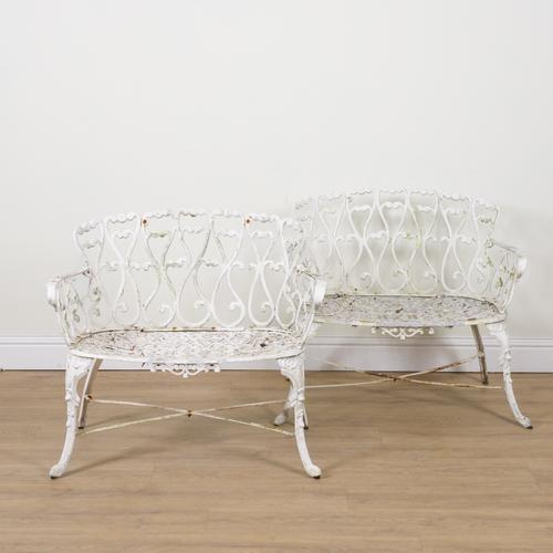A SUITE OF WHITE PAINTED CAST ALUMINIUM PATIO FURNITURE (5)