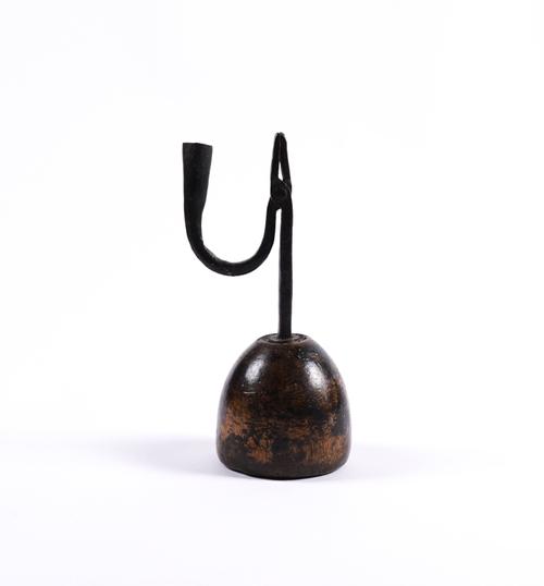 AN ENGLISH VERNACULAR SYCAMORE AND WROUGHT IRON RUSHNIP AND CANDLEHOLDER