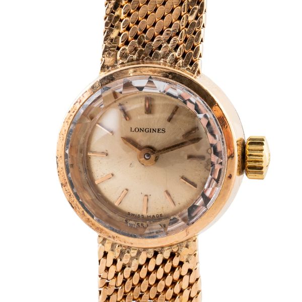 A LONGINES 18CT GOLD LADY'S WATCH