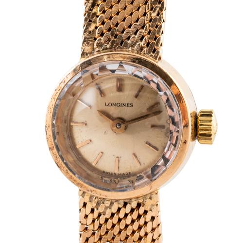 A LONGINES 18CT GOLD LADY'S WATCH