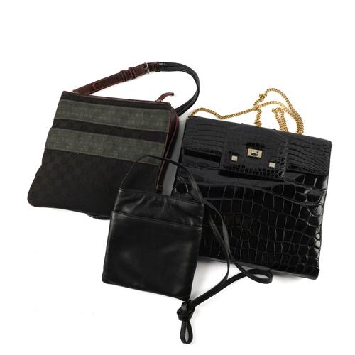 LOEWE: A PATENT BLACK BAG, A SMALL BLACK LEATHER BAG AND A FABRIC BAG (3)