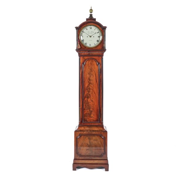 A LATE REGENCY MAHOGANY LONGCASE CLOCK