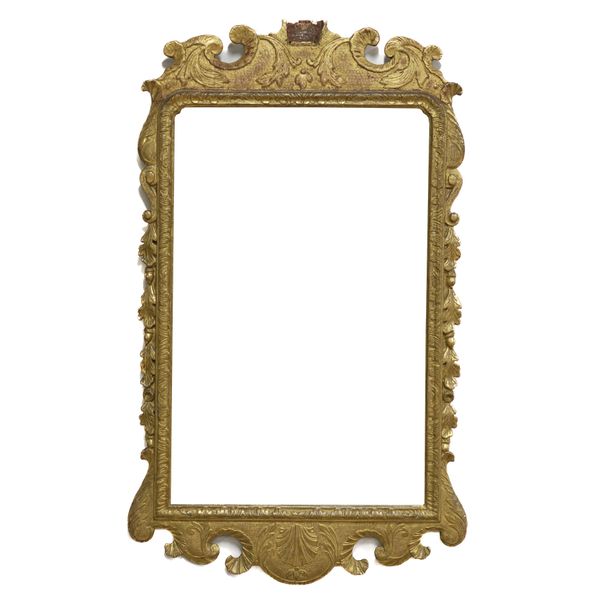 A GEORGE I STYLE GILTWOOD PIER MIRROR