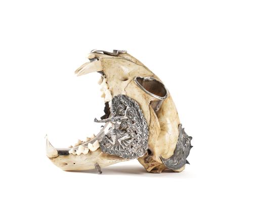 A SOUTH EAST ASIAN SILVER-MOUNTED LEOPARD’S SKULL SMOKING COMPENDIUM