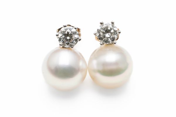 A PAIR OF DIAMOND AND SOUTH SEA PEARL EARRINGS