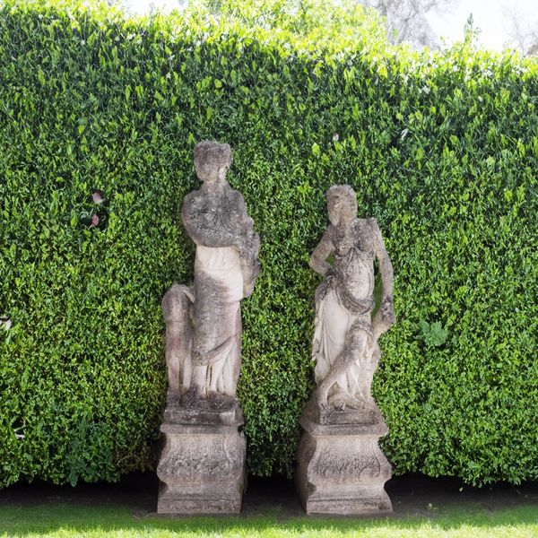 TWO RECONSTITUTED STONE FIGURES OF DIANA AND PLENTY (2)