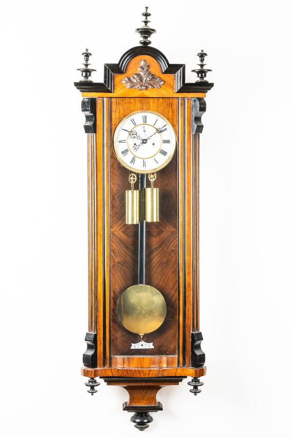 A WALNUT AND EBONISED STRIKING ‘VIENNA’ REGULATOR