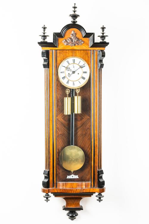 A WALNUT AND EBONISED STRIKING ‘VIENNA’ REGULATOR