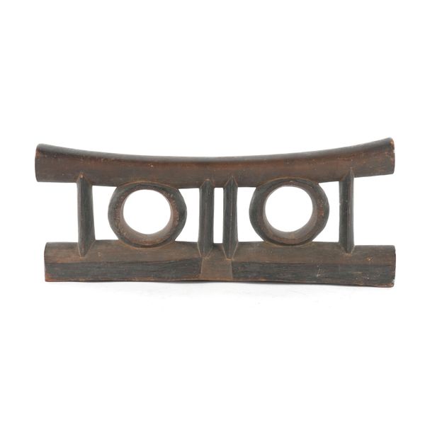 OF TRIBAL INTERST: A SOUTH AFRICAN WOOD HEADREST