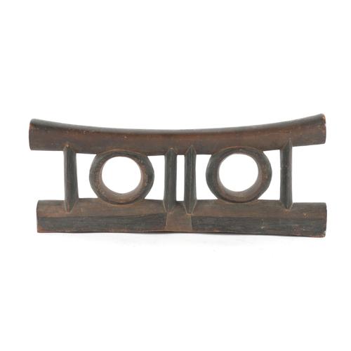 OF TRIBAL INTERST: A SOUTH AFRICAN WOOD HEADREST