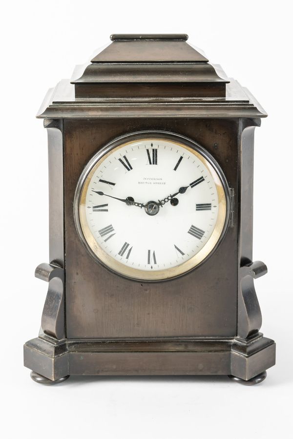 A WILLIAM IV SMALL BRONZE MANTEL CLOCK