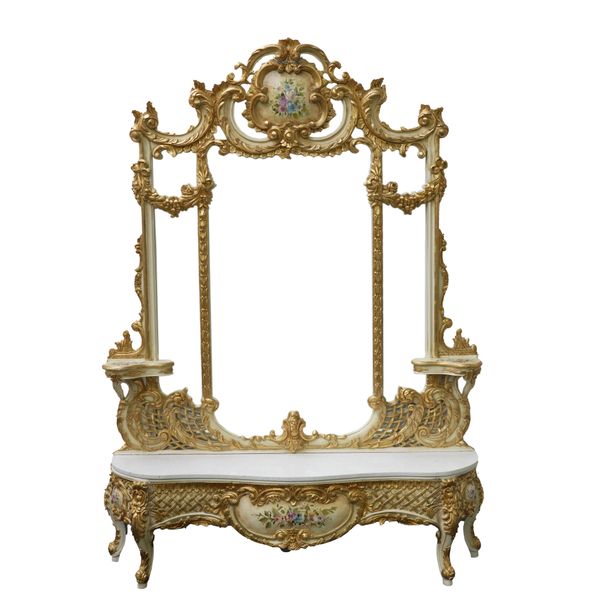 A LARGE FLORAL POLYCHROME PAINTED PARCEL GILT WALL MIRROR