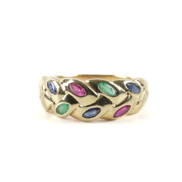 A GOLD, EMERALD, RUBY AND SAPPHIRE SET RING