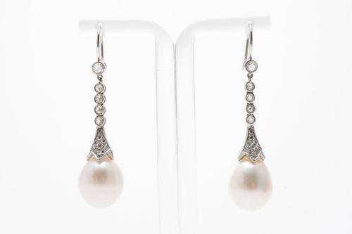 A PAIR OF DIAMOND AND SINGLE CULTURED PEARL DROP EARRINGS (3)