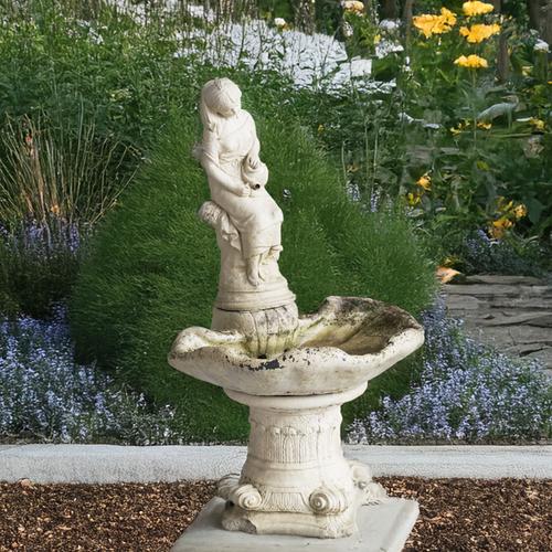 A RECONSTITUTED STONE WATER FEATURE