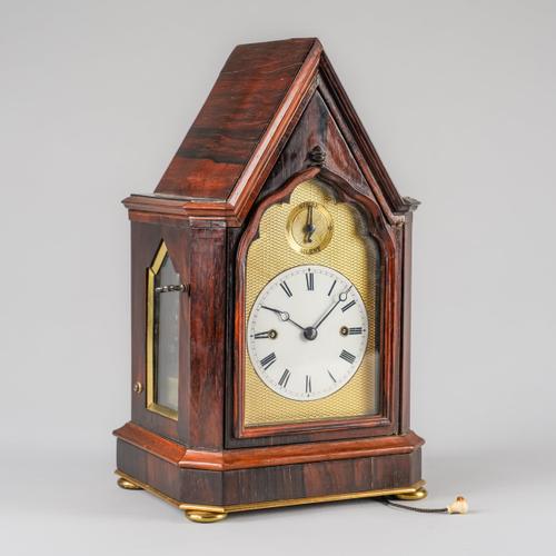 A FINE EARLY VICTORIAN GOTHIC REVIVAL ORMOLU-MOUNTED ROSEWOOD SMALL MANTEL CLOCK