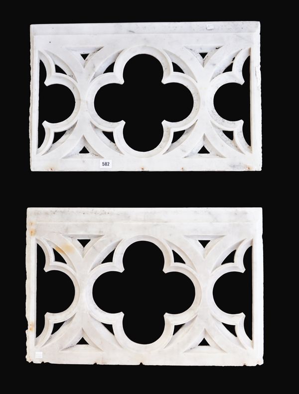 A PAIR OF FRET CUT WHITE MARBLE GOTHIC REVIVAL PANELS (2)