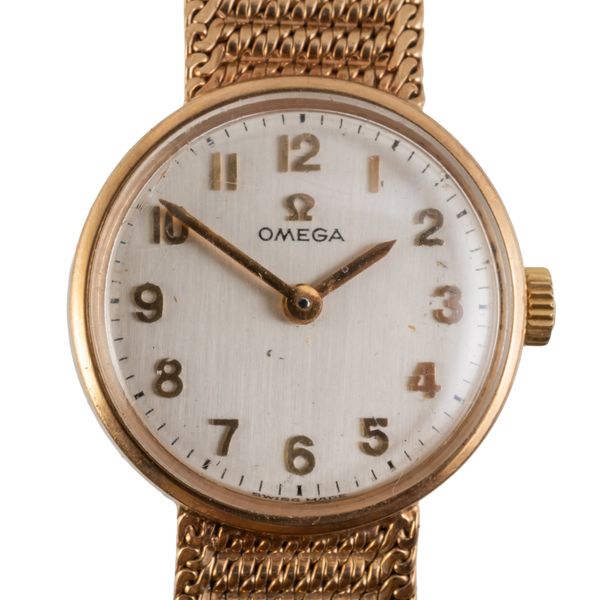 AN OMEGA 9CT GOLD LADY'S WATCH