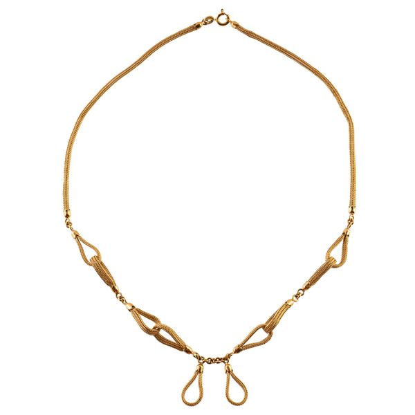 A FANCY GOLD NECKLACE