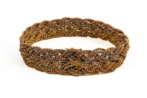 A BOODLES AND DUNTHORNE TRICOLOUR BRACELET