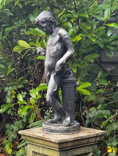 A LEAD FIGURE OF CUPID (2)