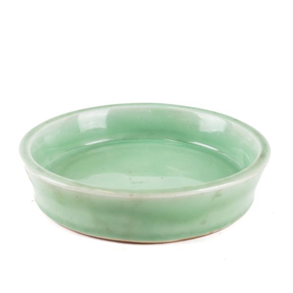 A CHINESE CELADON-GLAZED CIRCULAR WASHER OR PLANTER