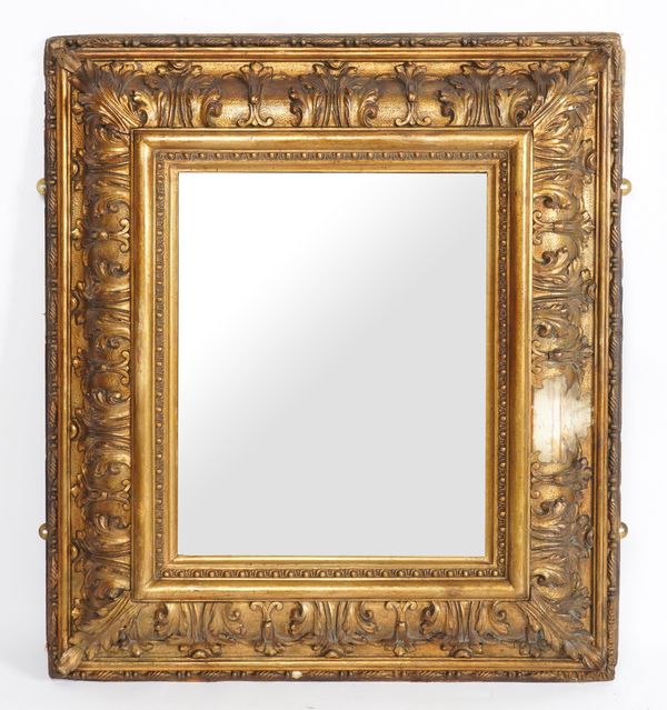 A 19TH CENTURY GILT FRAMED RECTANGULAR CUSHION FRAMED MIRROR