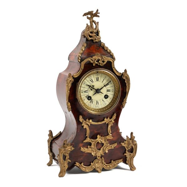 A FRENCH GILT-METAL-MOUNTED TORTOISESHELL-VENEERED MANTEL CLOCK