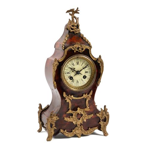 A FRENCH GILT-METAL-MOUNTED TORTOISESHELL-VENEERED MANTEL CLOCK