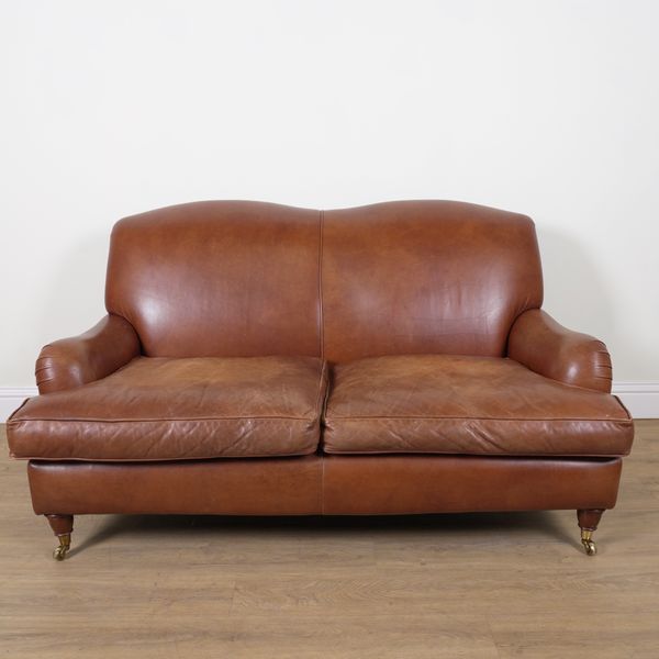 LAURA ASHLEY; A RICHMOND TWO SEATER TAN LEATHER UPHOLSTERED SOFA