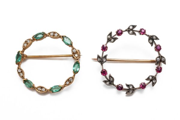 TWO DIAMOND AND GEMSTONE SET CIRCULAR BROOCHES (2)