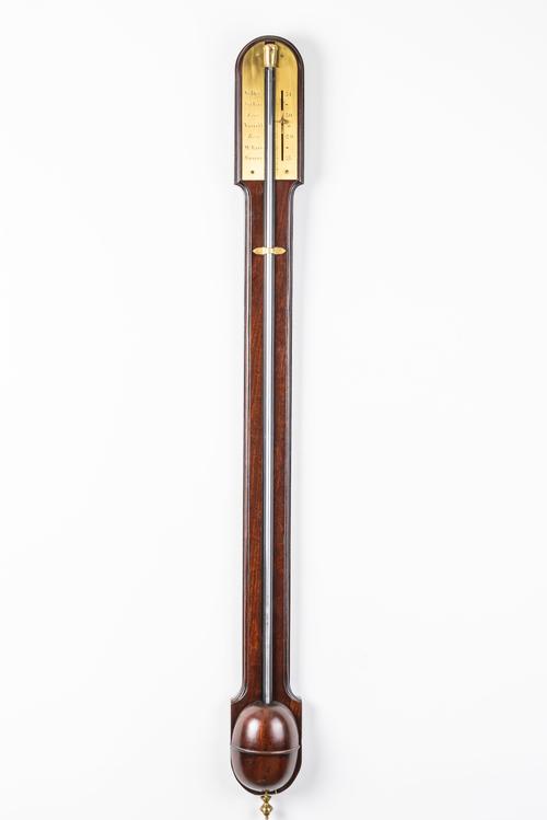 A GEORGE III MAHOGANY STICK BAROMETER