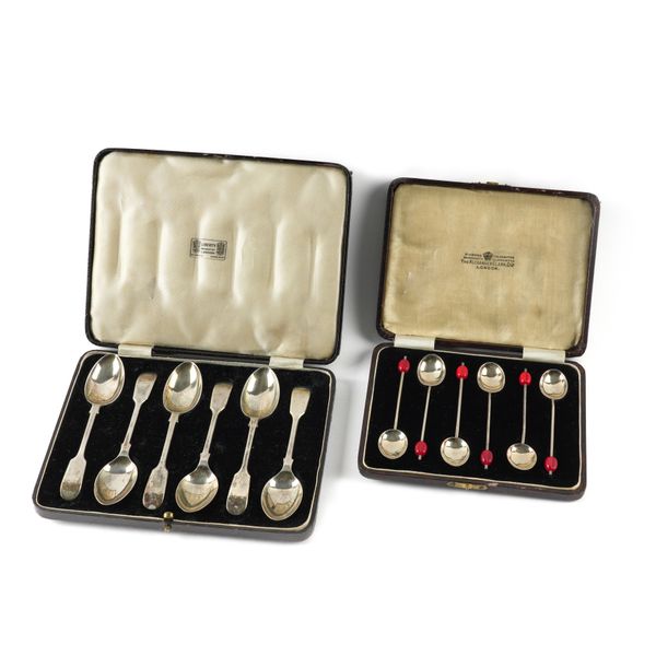 A SET OF SIX SILVER TEASPOONS AND A SET OF SIX SILVER COFFEE SPOONS (2)