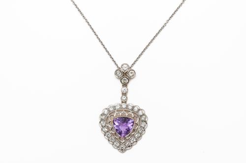 A DIAMOND AND AMETHYST PENDANT NECKLACE (2)