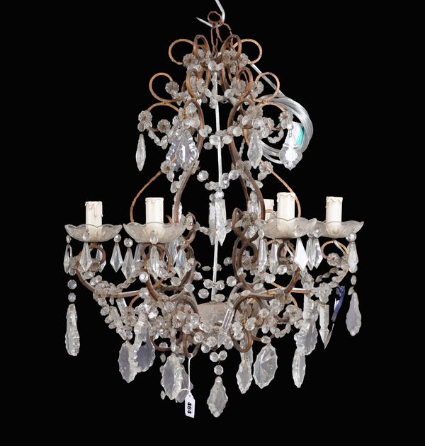 A PAIR OF GILT-METAL AND GLASS MOUNTED CARTOUCHE SHAPED SIX LIGHT CHANDELIERS (2)