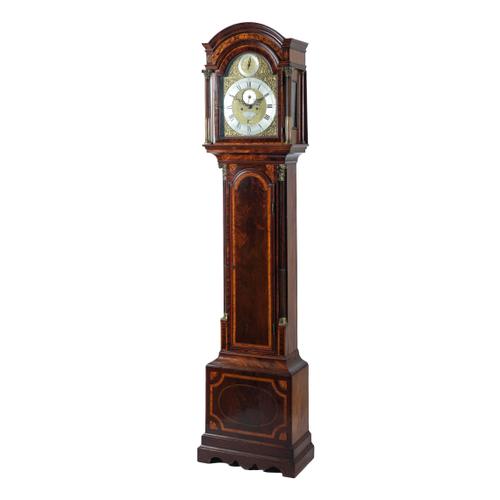 A GEORGE III BRASS-MOUNTED MAHOGANY, OUTLINED, CROSSBANDED AND INLAID LONGCASE CLOCK