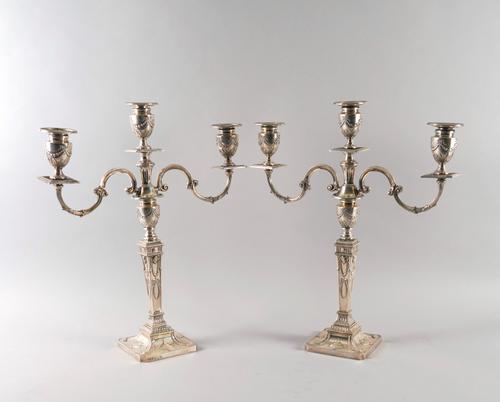 A PAIR OF SILVER THREE LIGHT TABLE CANDELABRA