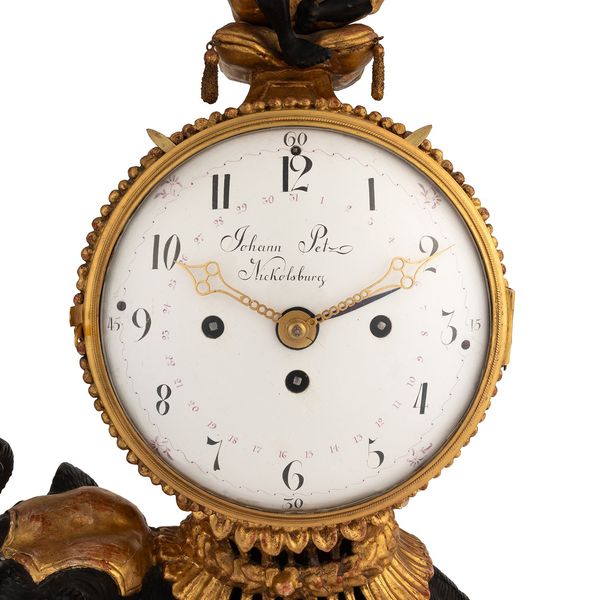AN IMPRESSIVE AUSTRO/HUNGARIAN GILTWOOD AND EBONISED QUARTER STRIKING ELEPHANT CLOCK WITH CALENDAR